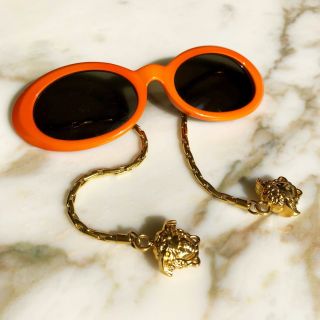 GIANNI VERSACE orange mod glasses w/ gold - toned chain arms & Medusa Head charms 10