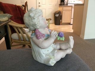 Lovely Vintage German Bisque Porcelain Piano Baby Girl Holding Grapes,  6” Tall 2