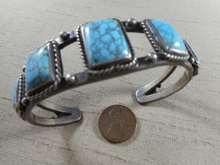 Fred Harvey Era Navajo Bracelet With 8 Turquoise & Horse Dog Design