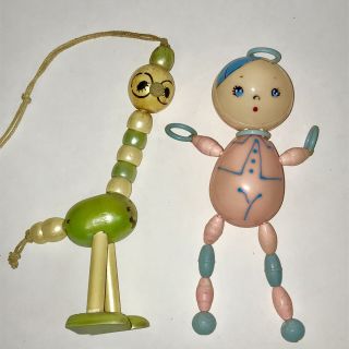 Vintage Crib Toy Baby Rattle Celluloid Doll Tinker Toy Wood Bead Ostrich Bird