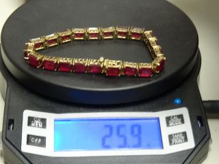 ESTATE VINTAGE GOLD WASHED STERLING TENNIS BRACELET w/ 31 CT RUBY 7.  75 