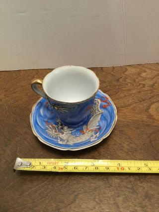 Occupied Japan Hand Painted Embossed Dragon Tea Cup And Saucer Blue Gold Mini