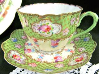Nippon Tea Cup And Saucer Painted Flowers Lime Green Color Teacup