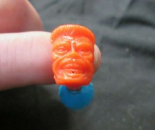 Vintage Orange & Blue Novelty Joke/prank Plastic Squirt Ring " Evil Face "