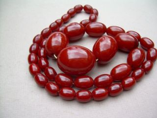 Antique Art Deco Cherry Amber Bakelite Bead Necklace 90.  72 grams. 3