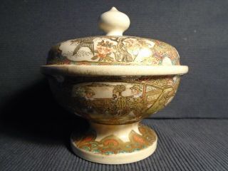 An antique Japanese pottery Satsuma footed bowl,  some damage,  HL & staining etc. 4