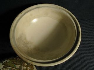 An antique Japanese pottery Satsuma footed bowl,  some damage,  HL & staining etc. 5