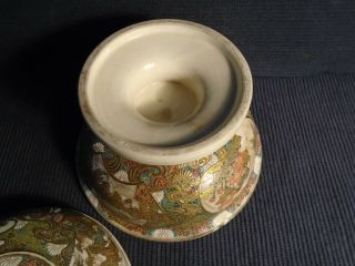 An antique Japanese pottery Satsuma footed bowl,  some damage,  HL & staining etc. 6