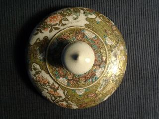 An antique Japanese pottery Satsuma footed bowl,  some damage,  HL & staining etc. 7