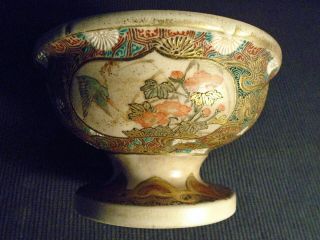 An antique Japanese pottery Satsuma footed bowl,  some damage,  HL & staining etc. 8