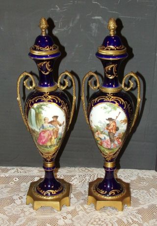 2 Vintage Rococo Urns Cobalt Blue Porcelain & Gilt Ornate Courting Couple Scene