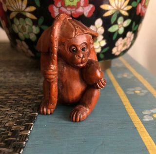 Hand Carved Japanese Boxwood Netsuke Monkey Under Leaf Dark Wood Figurine
