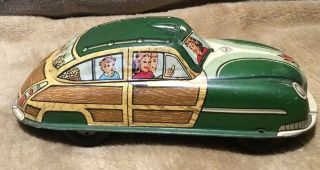 Vtg Tin Litho Marx Family Vacation Car Toy Sedan Green Wood Trim