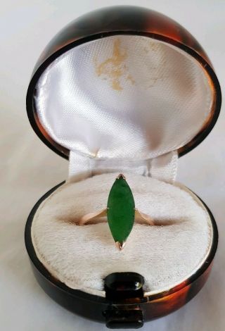 A Mid C20th Chinese Export High Carat Gold Ring.  Set With A Green Jade Cabochon