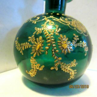 Victorian era dark green glass,  gilded deco on a perfume scent bottle 2