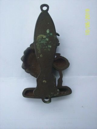 Small vintage brass door knocker.  Lady with flowers. 3