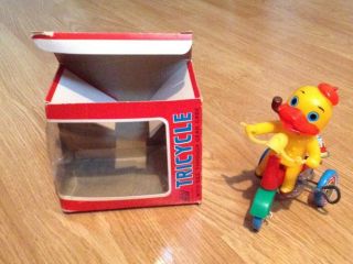 Vintage Tin Wind Up Toy Duck On A Bike