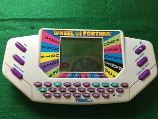 Vintage Handheld Wheel Of Fortune Electronic Game By Tiger Electronics