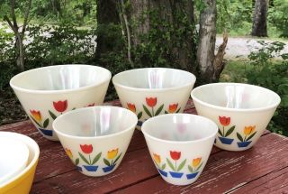 Vintage Fire King Tulip Set Of Four Nesting Mixing Bowls And Grease Bowl No Lid.