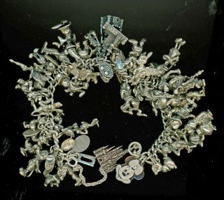 45 Walt Disney Charms 150.  25 Grams Vintage Sterling Silver Charm Bracelet