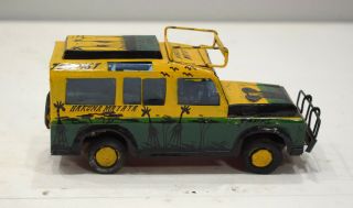 African Safari Recycled Red Tin Truck Pop Up Roof Tanzania Toy Safari Truck