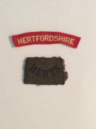 Two Hertfordshire Regiment Cloth Shoulder Titles Including Rare Early War Slipon