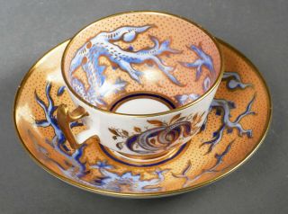 Vintage Hand Painted Cup And Saucer Peach With Blue Dragon Or Griffin Design