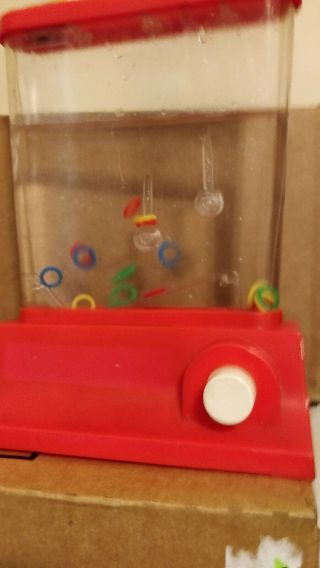 Vintage 1976 Tomy Wonderful Waterfuls Ring Toss Game (red)
