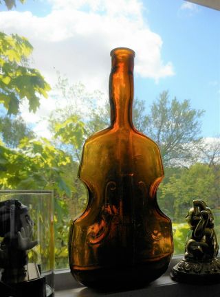 An Earlier,  Blown Figural Violin C.  1880 ' s.  A Rich Amber,  9 3/4 