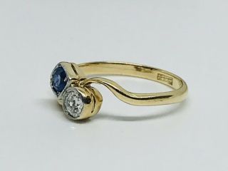 Diamond and Sapphire Crossover ring in 18ct gold Size N 3