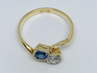 Diamond and Sapphire Crossover ring in 18ct gold Size N 4