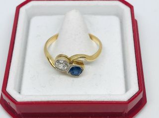 Diamond and Sapphire Crossover ring in 18ct gold Size N 6