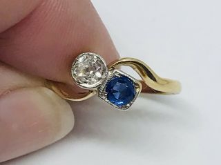Diamond and Sapphire Crossover ring in 18ct gold Size N 7
