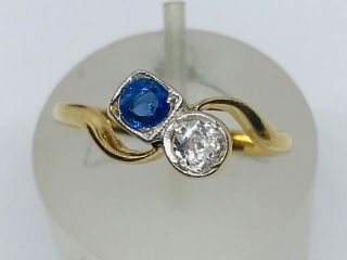 Diamond and Sapphire Crossover ring in 18ct gold Size N 8