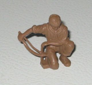 Marx 1950s Boy Scout Starting Fire With Friction Bow In Brown