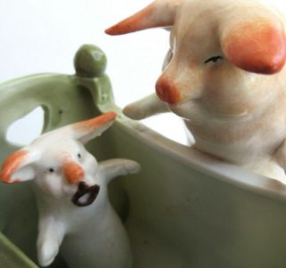 Antique Pig Piglet In Cradle Green Ceramic Bisque Fairing Figurine Germany Oink