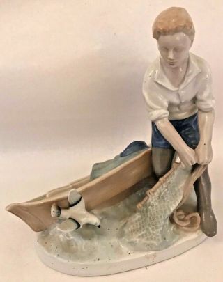 Antique Figure Of Boy With Boat And Nets