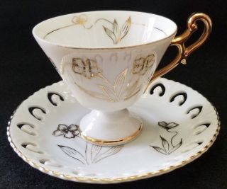 Vintage Footed Raised Gold Design Tea Cup & Saucer Ornate Gold Handle