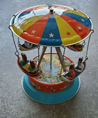 Vintage Tin Toy Collectible Merry Go Round Turning Boats Windup