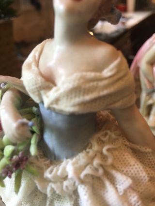 fabris porcelain figurine some broken lace,  finger appears to have been repaired 2