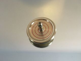 Brass spinning top with ceramic bearing,  index,  swirl design over 7 min spin 3