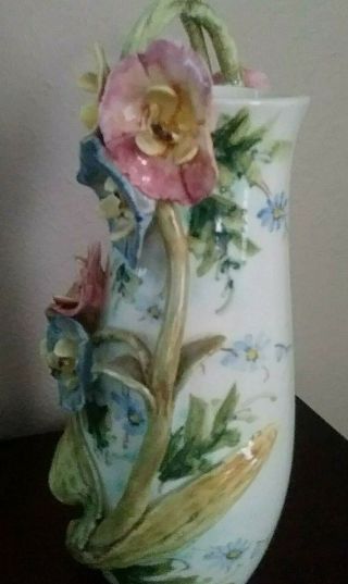 Vintage czechoslovakia vase with applied flowers and handle marked and numbered 4