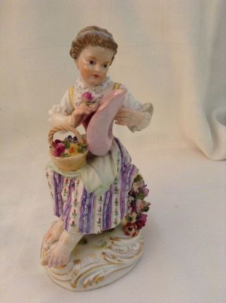 Antique Meissen Lady Sitting On A Basket Of Flowers Holding A Hat And Rose