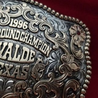 RODEO TROPHY BUCKLE VINTAGE 1996 UVALDE TEXAS ALL AROUND RODEO CHAMPION 45 6