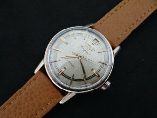 VINTAGE LONGINES CONQUEST PINK GOLD & S.  STEEL AUTOMATIC DATE AT 12 11