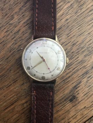 Vintage Movado 18k gold watch 10