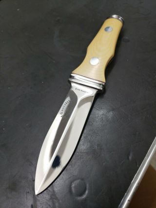 Vintage A.  G.  Russell Sting 1977 Ivory Micarta Handle