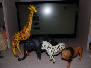 Marvel Trading Corp Giraffe 13.  5 " T,  Elephant 10 " W,  Lion 7.  5 " W,  Zebra 5.  5 " Hong Kong