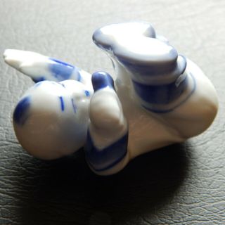A rare & unusual Chinese blue and white porcelain figure of a baby 3