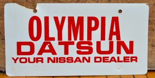 Set 2 VTG embossed Metal License Plate Frame,  Inserts OLYMPIA DATSUN NISSAN WA 7